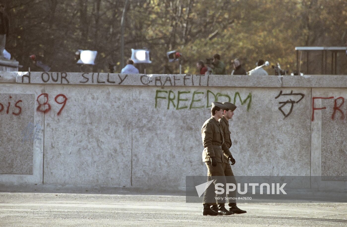 Border guards near Berlin Wall