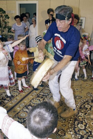 Grandmothers for Peace movement rep at orphanage