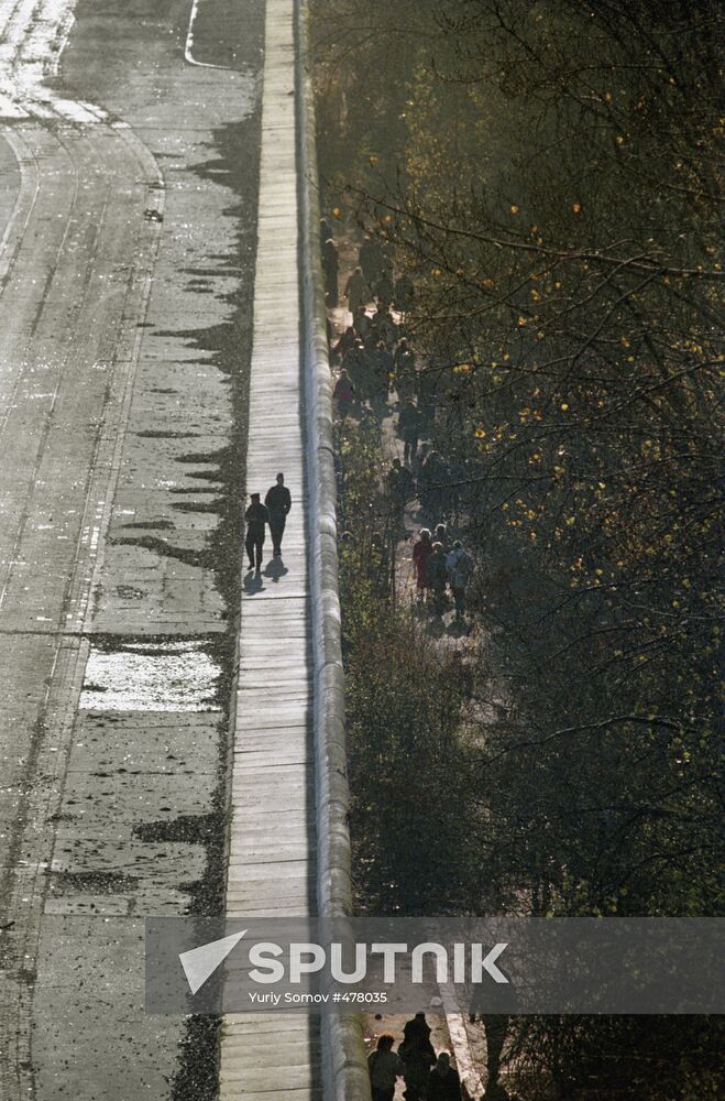 Two sides of Berlin Wall