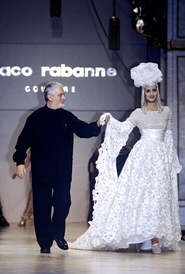 Fashion designer Paco Rabanne with his model