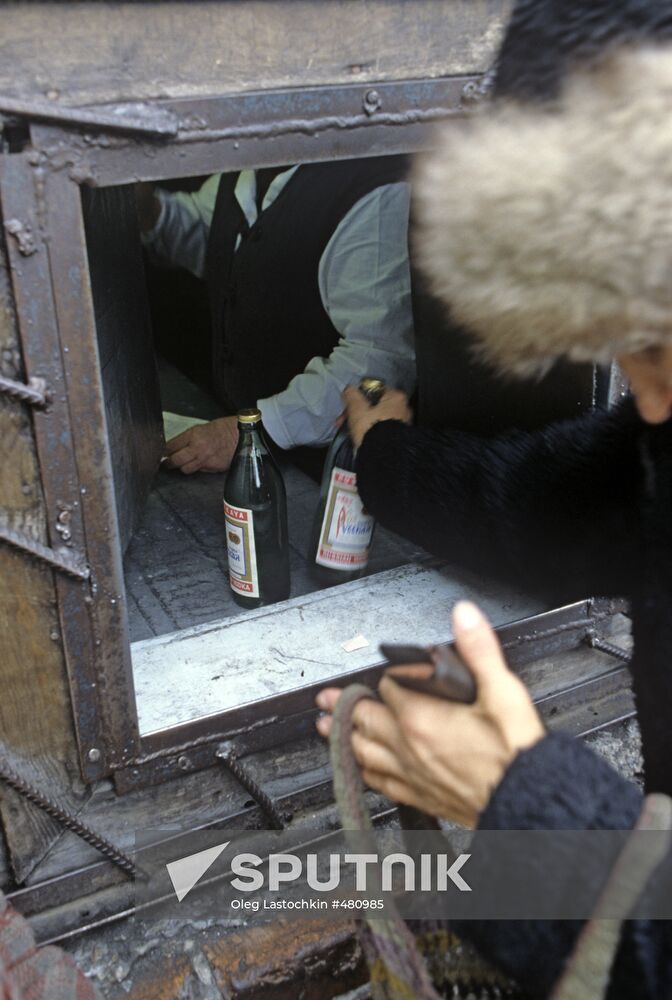 Selling vodka in miners' village