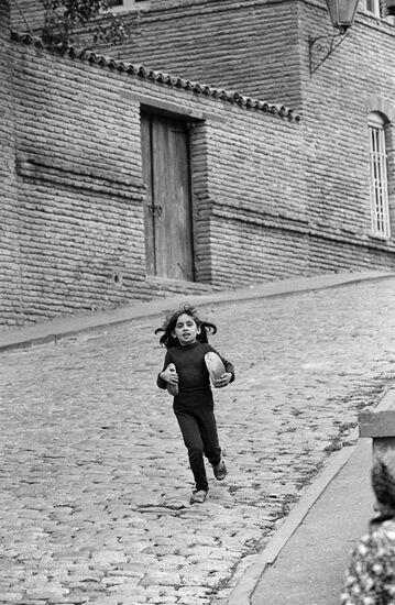 Girl with loaf of bread