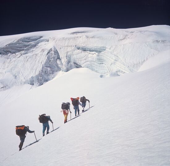Mountain-climbers ascending the Lenin peak