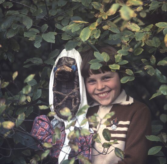 Girl with self-made doll