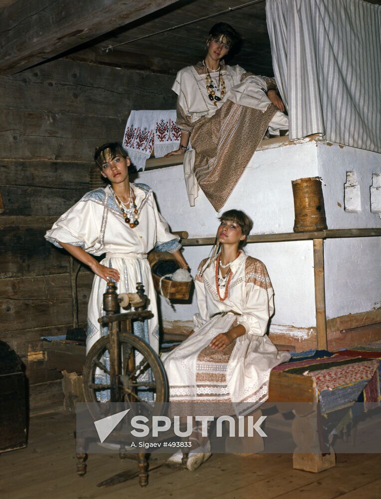Models of clothes made in national style