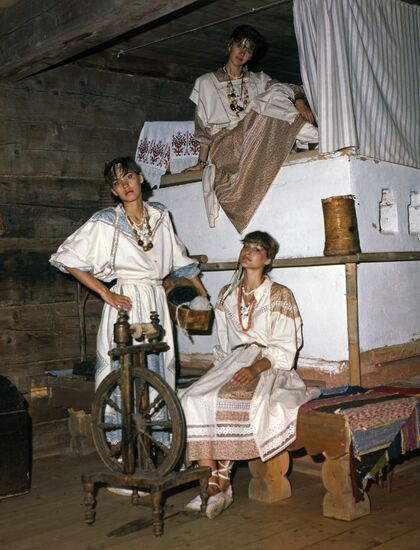 Models of clothes made in national style