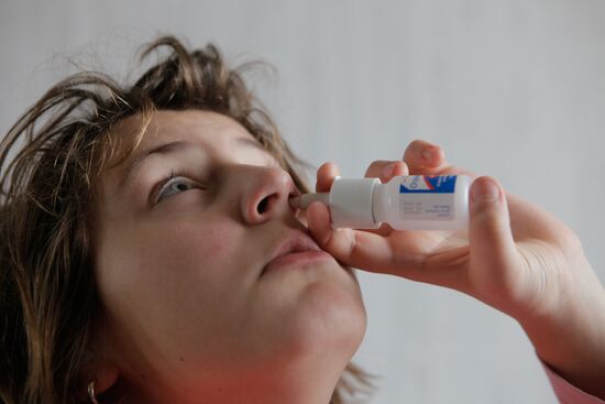 Child with flu treated at home