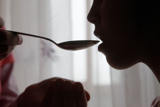 Child with flu treated at home