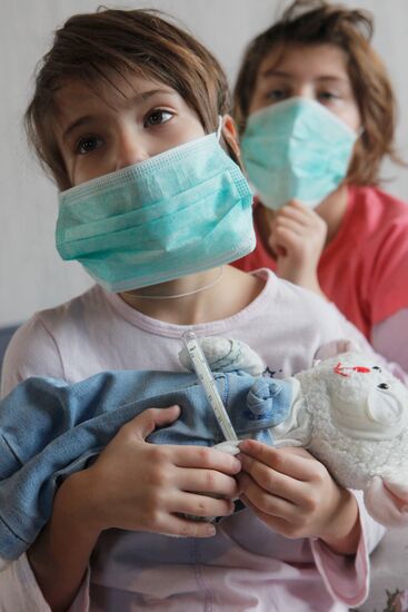 Children with flue treated at home