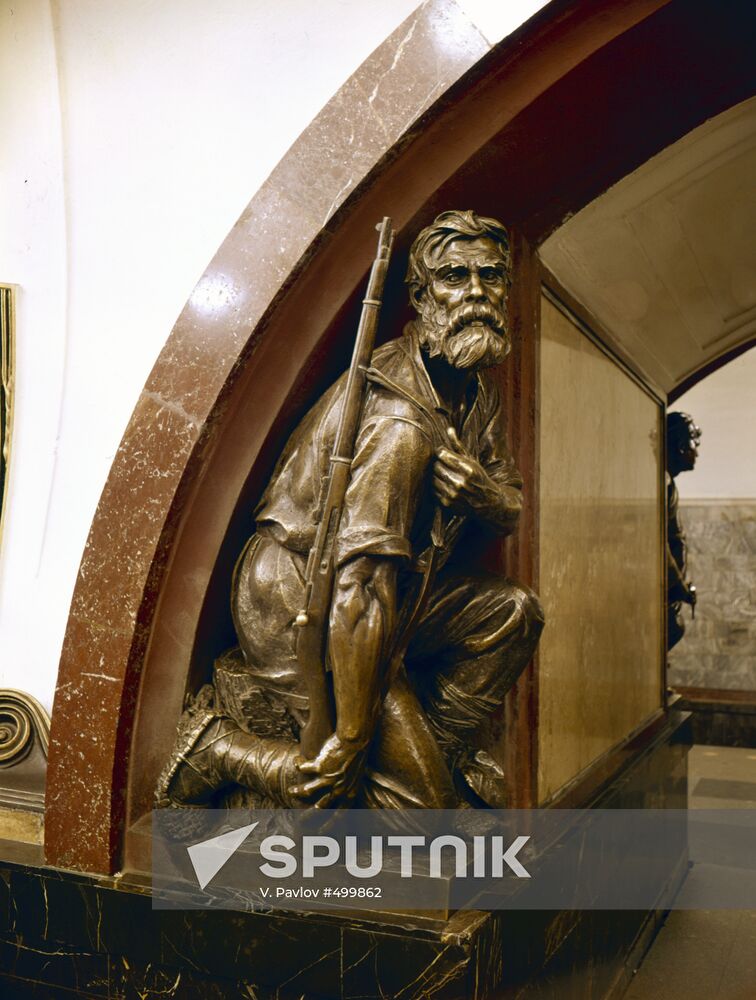 Statue on Ploshchad Revolyutsii subway station