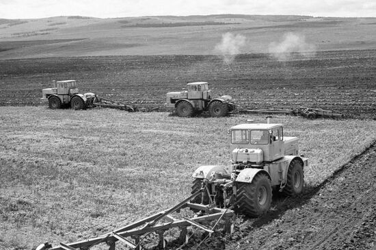 Arable land collective farm tractor
