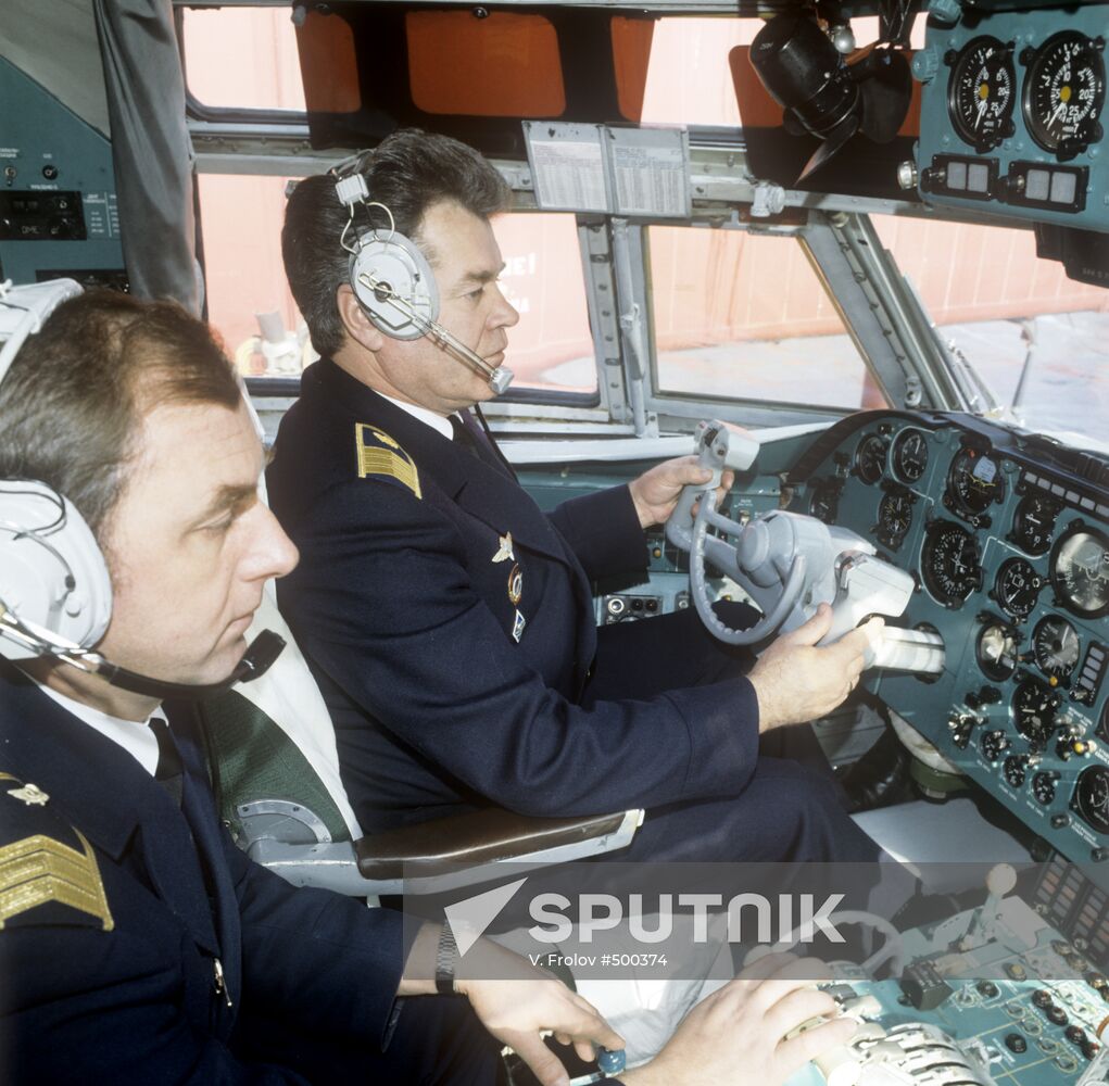 Pilots in the cockpit of ‘IL-62M’ aircraft