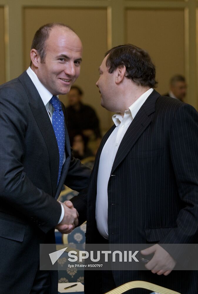 Andrei Melnichenko, Mikhail Fridman