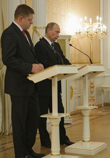 Vladimir Putin and Robert Fico