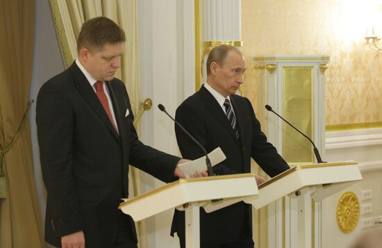 Vladimir Putin and Robert Fico
