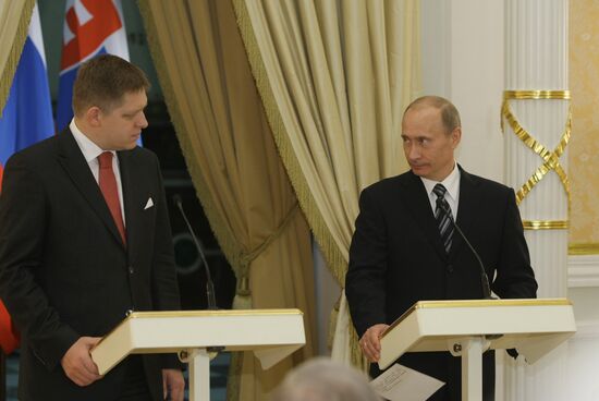 Vladimir Putin and Robert Fico