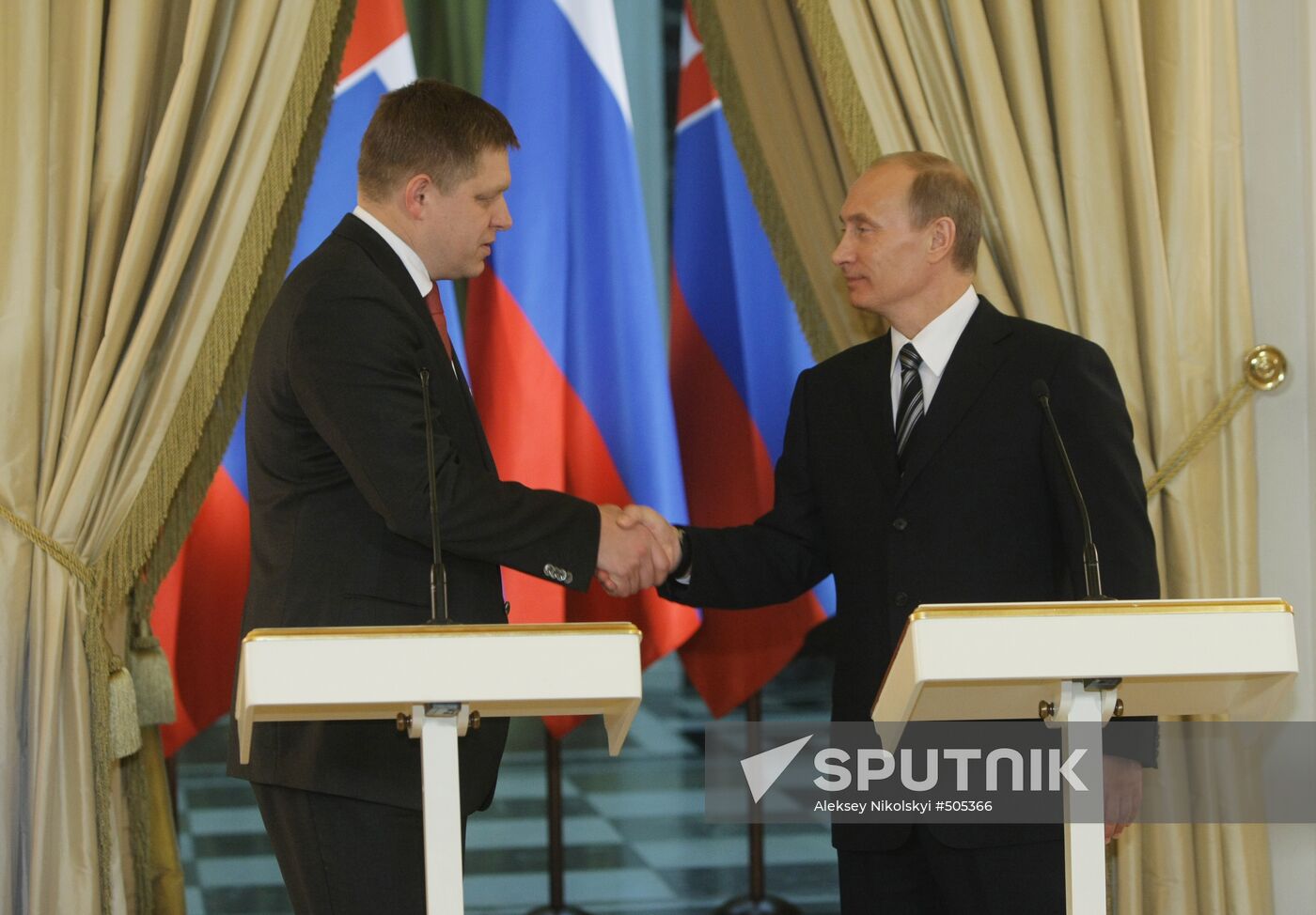 Vladimir Putin and Robert Fico