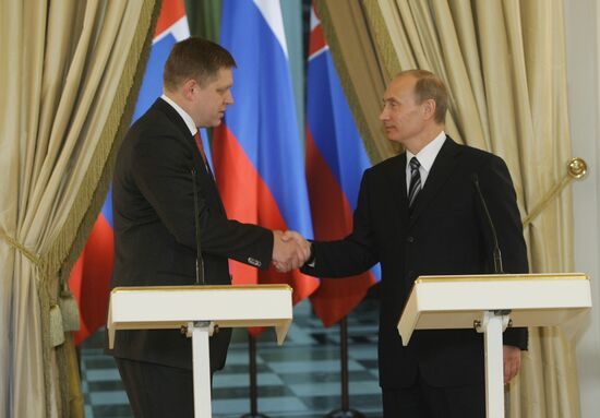 Vladimir Putin and Robert Fico