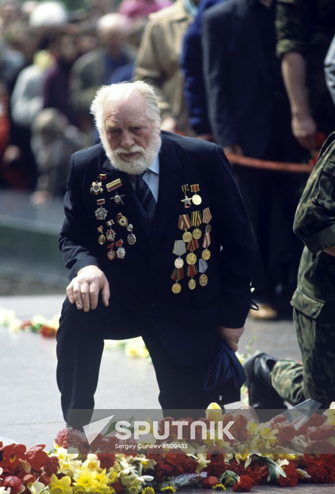 Victory Day. War Veteran at Eternal Flame