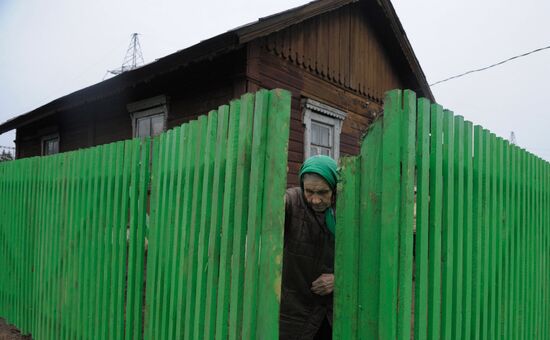 Pensioner Yelena Golubeva had a new fence installed