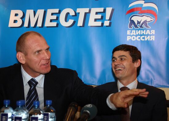 Olympic champions Alexander Popov and Alexander Karelin