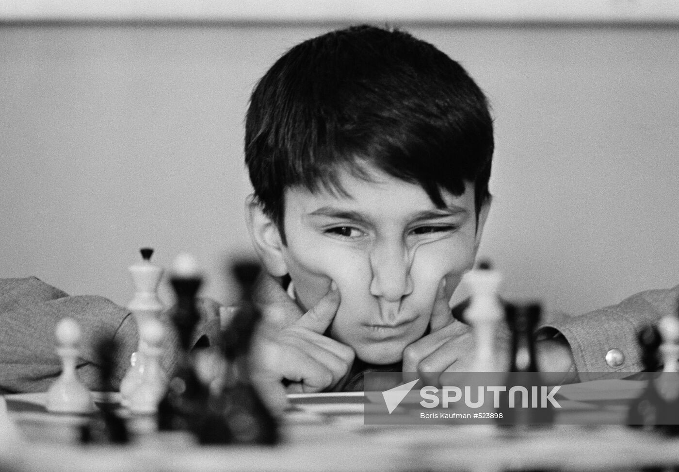 Student at chess school at Palace of Pioneers