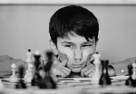 Student at chess school at Palace of Pioneers