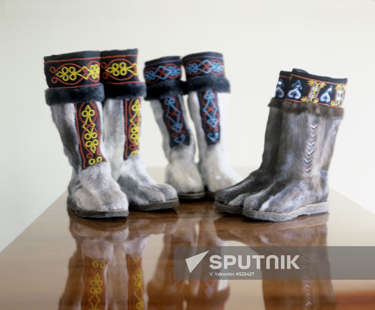 Women's high boots made of deer fur decorated with beads