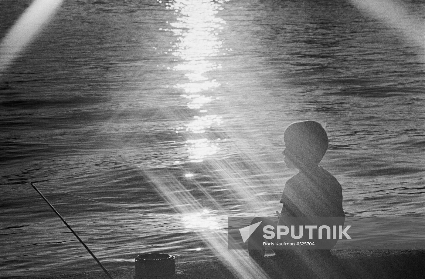 A boy out fishing