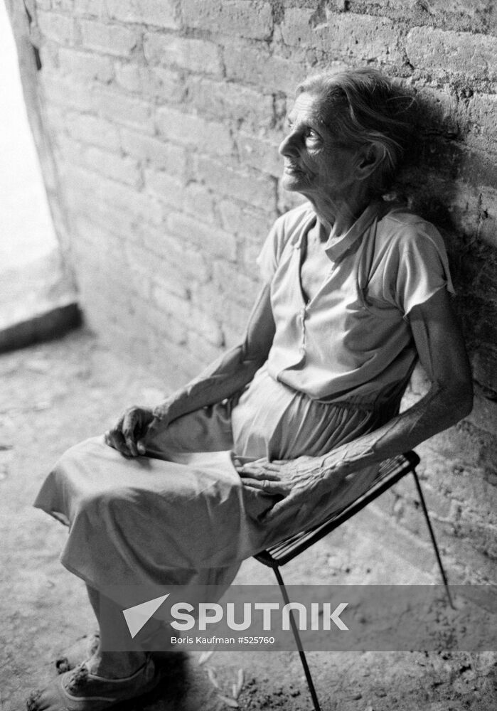 Life experience. An old woman and her hand