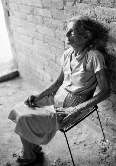 Life experience. An old woman and her hand