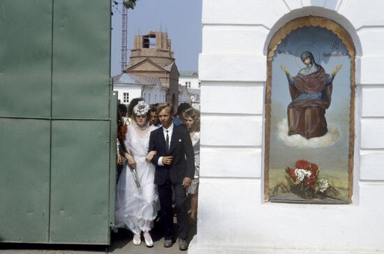 Newly-weds before church wedding