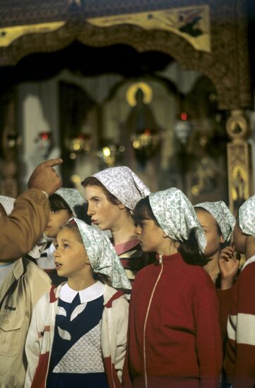 Choirgirls during liturgy in a church