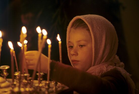 A young parishioner in church