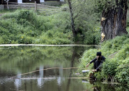 A monk is fishing