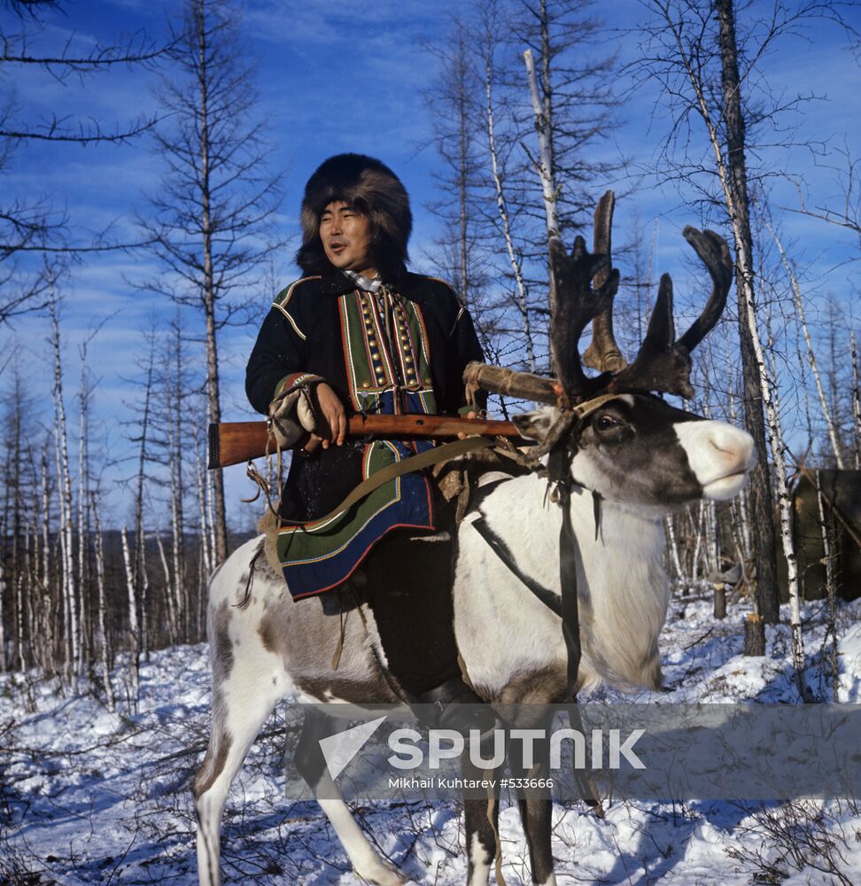 Evenki hunter wearing a national outfit