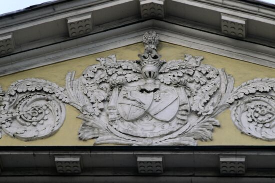 Relief with emblem