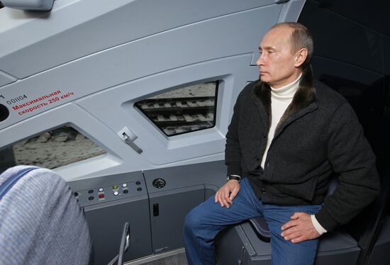 Vladimir Putin takes trip on newly launched Sapsan bullet train