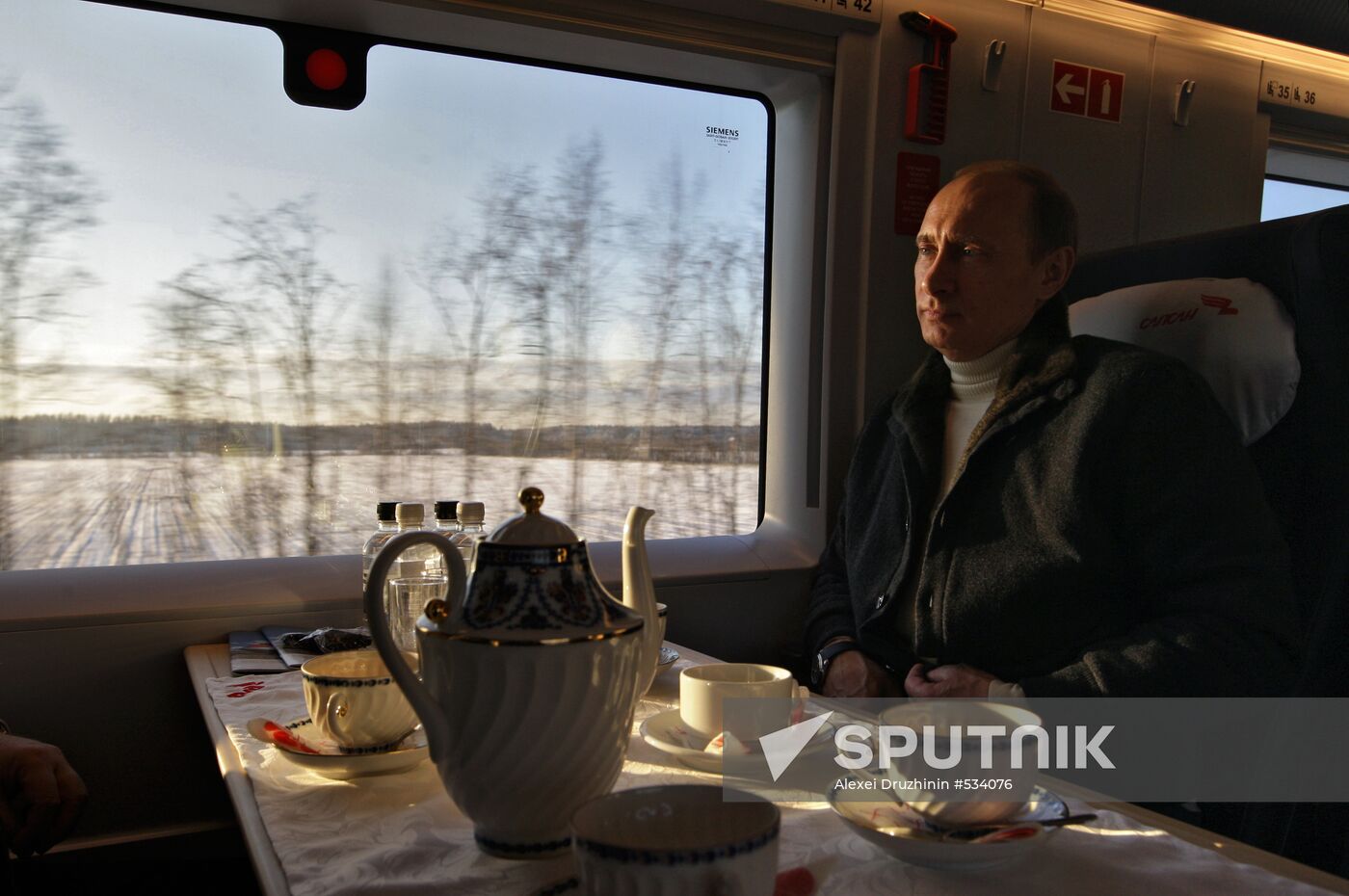 Vladimir Putin takes trip on newly launched Sapsan bullet train