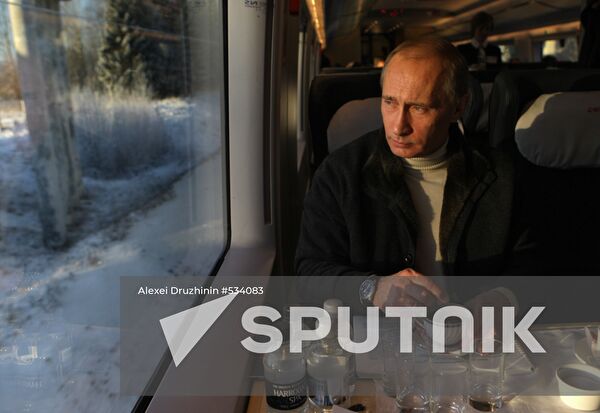 Vladimir Putin takes trip on newly launched Sapsan bullet train