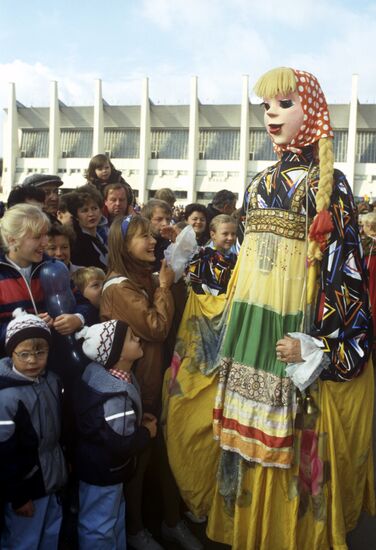 Spectators at festival of folk games on Moscow Day