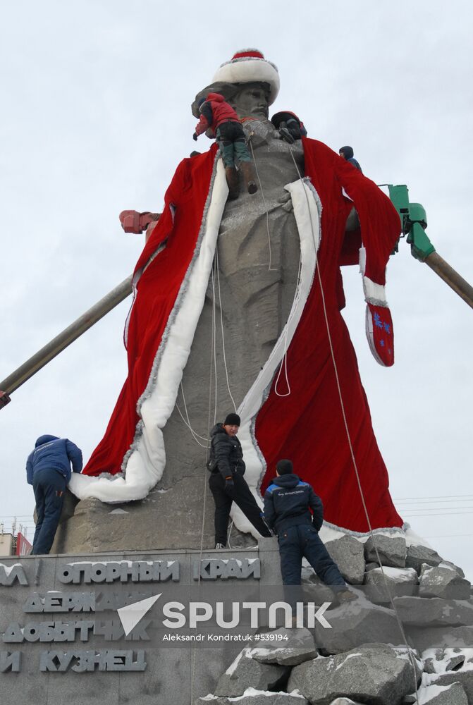 Sculpture of worker from Ural Tale dressed in Santa's costume
