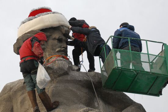 Sculpture of worker from Ural Tale dressed in Santa's costume