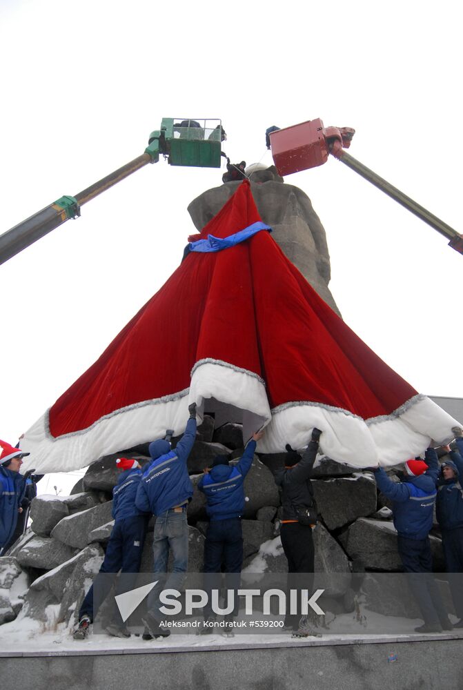 Sculpture of worker from Ural Tale dressed in Santa's costume