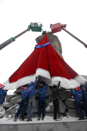 Sculpture of worker from Ural Tale dressed in Santa's costume