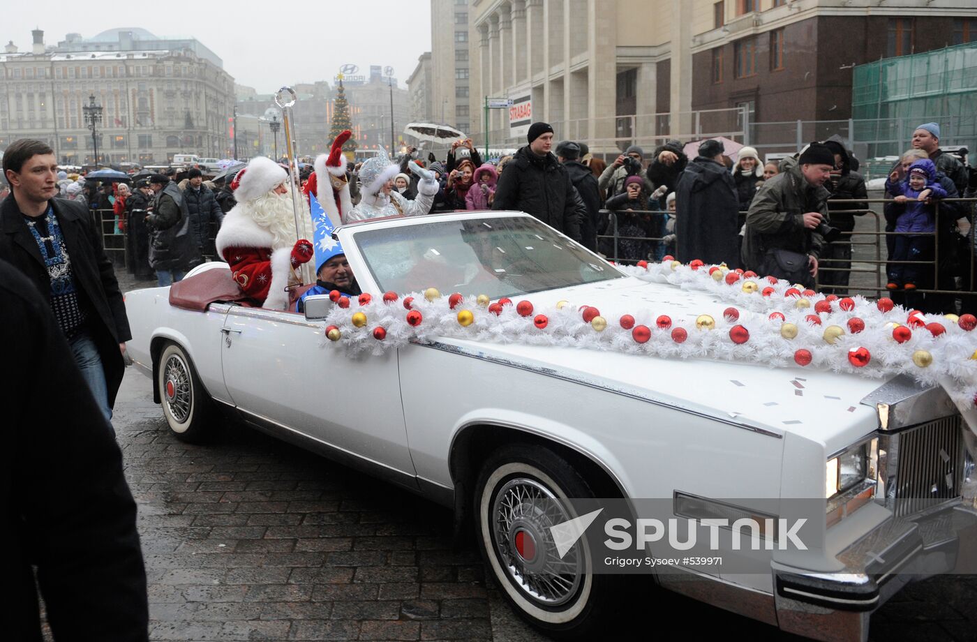 Russian Santa arrives from Veliky Ustyug in white cabriolet