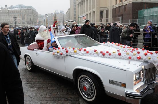 Russian Santa arrives from Veliky Ustyug in white cabriolet