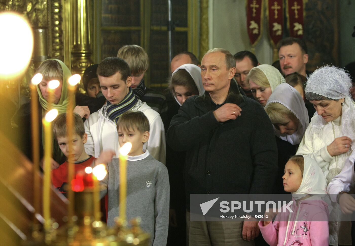 Vladimir Putin at Christmas service in Kostroma church
