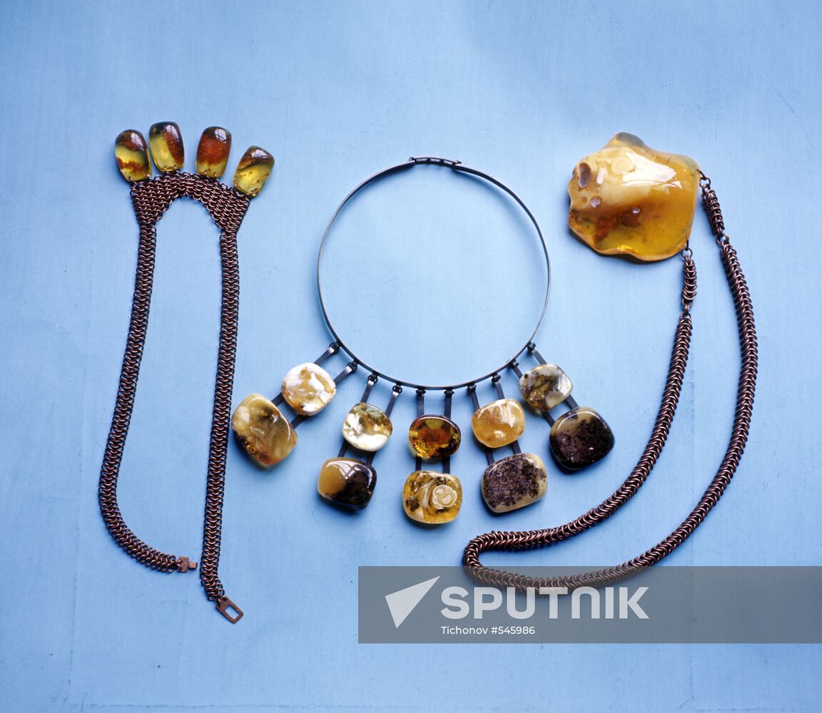 Ancient jewelry made of amber and metal