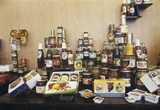 Stand displaying canned fruit and vegetables